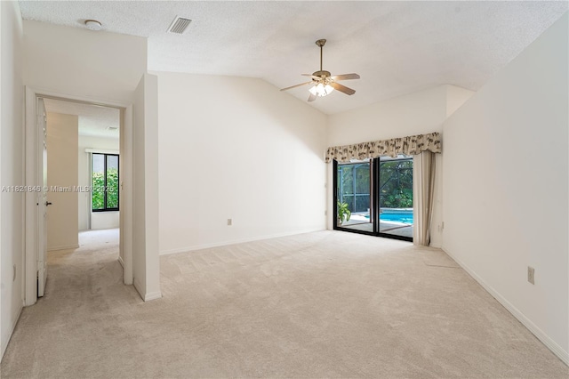 851 Altavista Ter, Davie, FL 33325 - unfurnished room featuring a ceiling fan, light carpet, plenty of natural light, and lofted ceiling