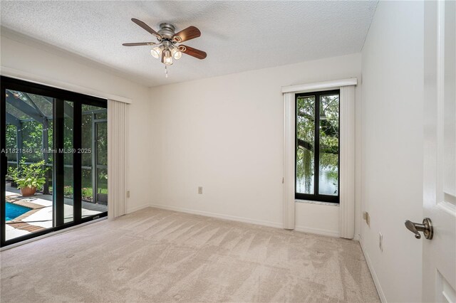 851 Altavista Ter, Davie, FL 33325 - unfurnished room with carpet, a textured ceiling, and ceiling fan