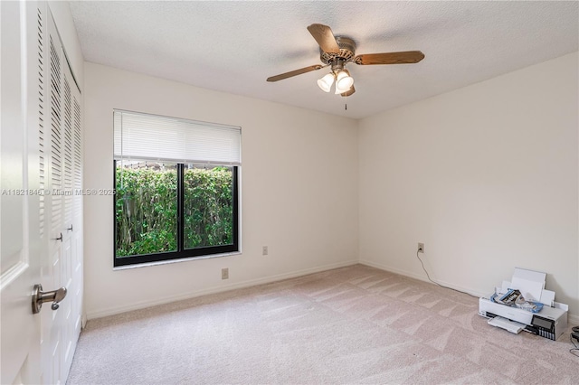 851 Altavista Ter, Davie, FL 33325 - empty room with light carpet, a ceiling fan, and a textured ceiling