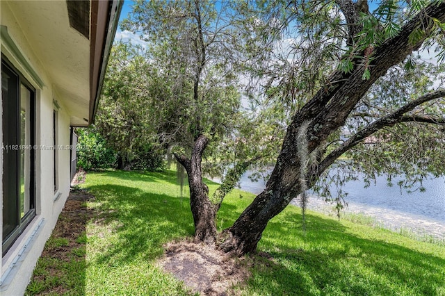 851 Altavista Ter, Davie, FL 33325 - view of green lawn with a water view