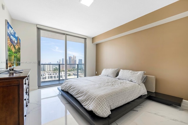 300 Sunny Isles Blvd Unit 4-2303, Sunny Isles Beach, FL 33160 - bedroom with a view of skyline, expansive windows, access to outside, and multiple windows