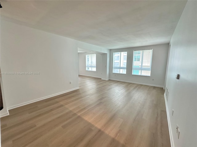 7350 SW 89th St Unit 602S, Miami, FL 33156 - unfurnished room featuring wood finished floors and baseboards