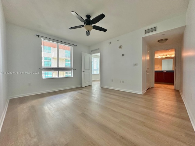 7350 SW 89th St Unit 602S, Miami, FL 33156 - empty room with light wood-style floors and ceiling fan