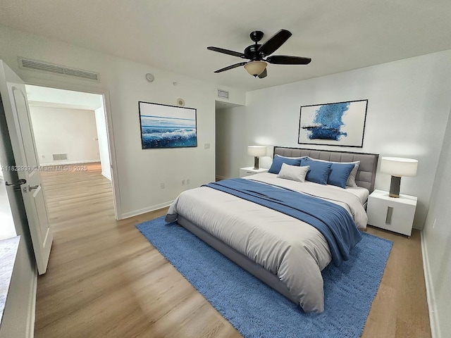 7350 SW 89th St Unit 602S, Miami, FL 33156 - bedroom featuring light wood-style flooring and a ceiling fan