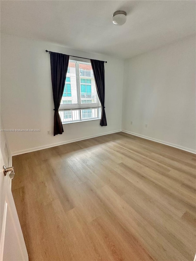 7350 SW 89th St Unit 602S, Miami, FL 33156 - empty room with light wood finished floors