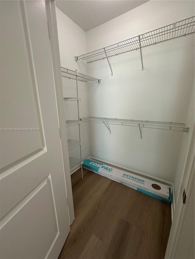 7350 SW 89th St Unit 602S, Miami, FL 33156 - walk in closet with wood finished floors