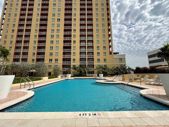 7350 SW 89th St Unit 602S, Miami, FL 33156 - community pool featuring a patio