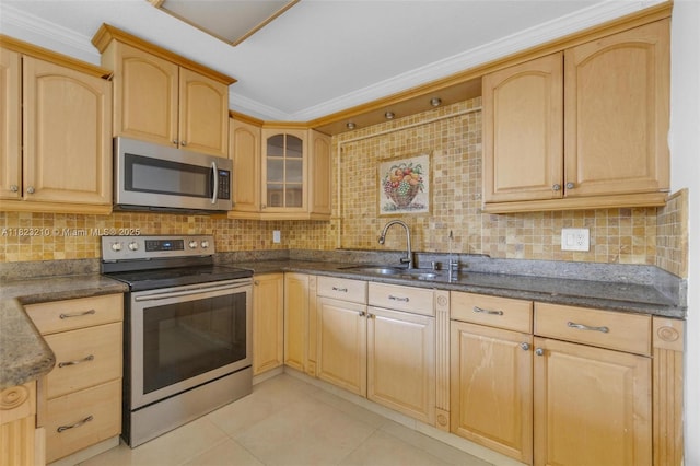 12440 SW 207th Ter, Miami, FL 33177 - kitchen featuring stainless steel appliances, light brown cabinets, backsplash, light tile patterned flooring, and crown molding