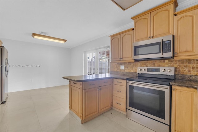 12440 SW 207th Ter, Miami, FL 33177 - kitchen with appliances with stainless steel finishes, light brown cabinets, and ornamental molding