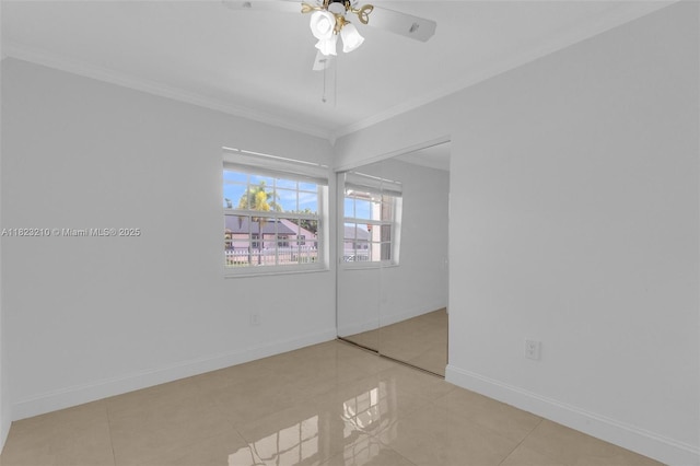 12440 SW 207th Ter, Miami, FL 33177 - tiled empty room featuring ornamental molding and a ceiling fan