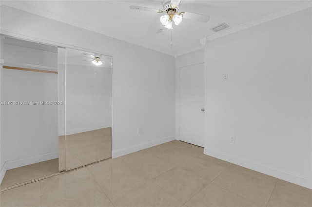 12440 SW 207th Ter, Miami, FL 33177 - unfurnished bedroom featuring crown molding, ceiling fan, a closet, and tile patterned flooring