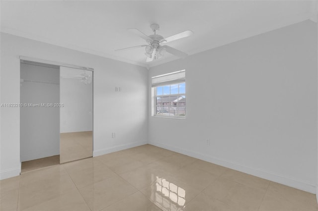 12440 SW 207th Ter, Miami, FL 33177 - unfurnished bedroom featuring a closet, crown molding, ceiling fan, and tile patterned flooring