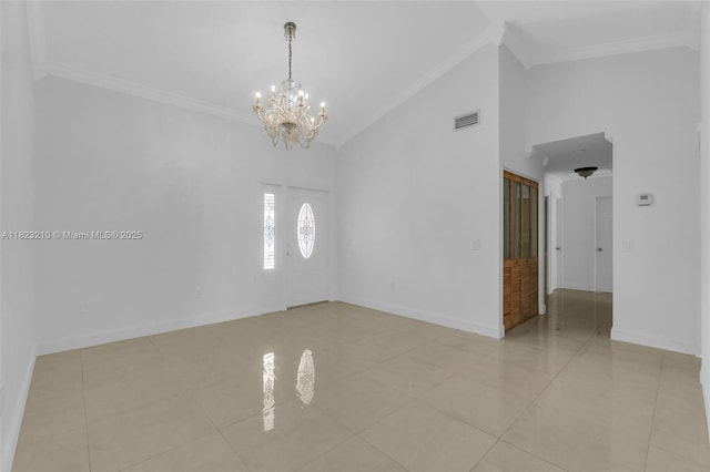 12440 SW 207th Ter, Miami, FL 33177 - empty room featuring a chandelier, ornamental molding, light tile patterned floors, and high vaulted ceiling