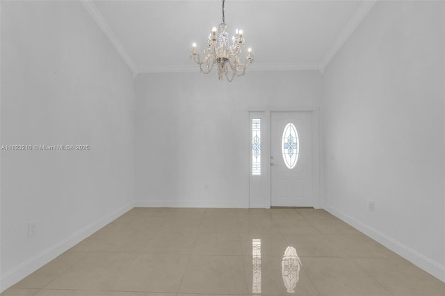 12440 SW 207th Ter, Miami, FL 33177 - entrance foyer with a chandelier, ornamental molding, and light tile patterned floors