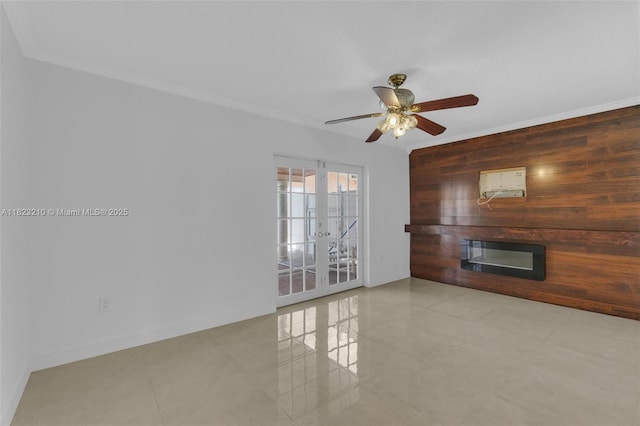 12440 SW 207th Ter, Miami, FL 33177 - unfurnished living room featuring crown molding, wood walls, tile patterned flooring, a ceiling fan, and french doors