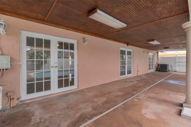12440 SW 207th Ter, Miami, FL 33177 - view of patio featuring french doors
