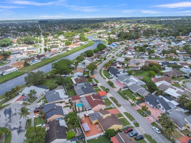12440 SW 207th Ter, Miami, FL 33177 - aerial view of property and surrounding area with a large body of water and nearby suburban area