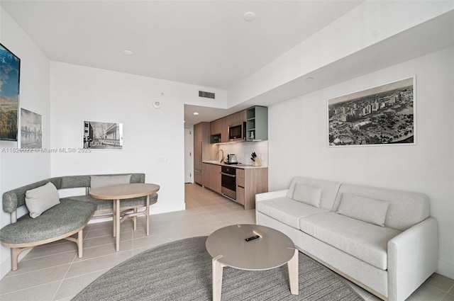 159 NE 6th St Unit 3407, Miami, FL 33132 - living area with light tile patterned floors and recessed lighting