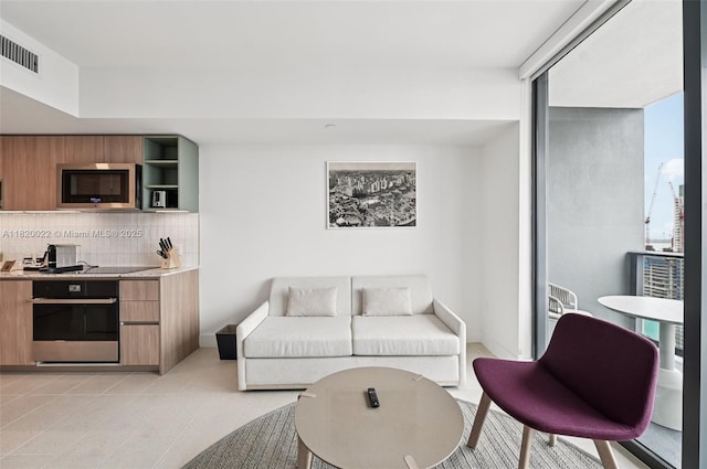 159 NE 6th St Unit 3407, Miami, FL 33132 - living room with light tile patterned floors