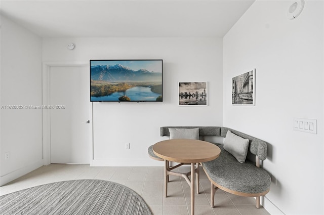 159 NE 6th St Unit 3407, Miami, FL 33132 - living area featuring light tile patterned flooring and baseboards