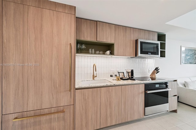 159 NE 6th St Unit 3407, Miami, FL 33132 - kitchen featuring oven, open shelves, stainless steel microwave, black electric stovetop, and tasteful backsplash