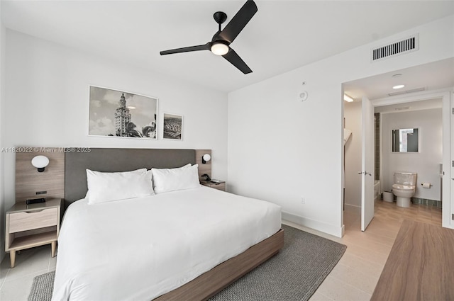 159 NE 6th St Unit 3407, Miami, FL 33132 - bedroom featuring ensuite bathroom and ceiling fan