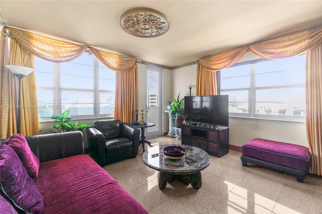 100 Lincoln Rd Unit 811, Miami Beach, FL 33139 - living room featuring baseboards and granite tiled floors