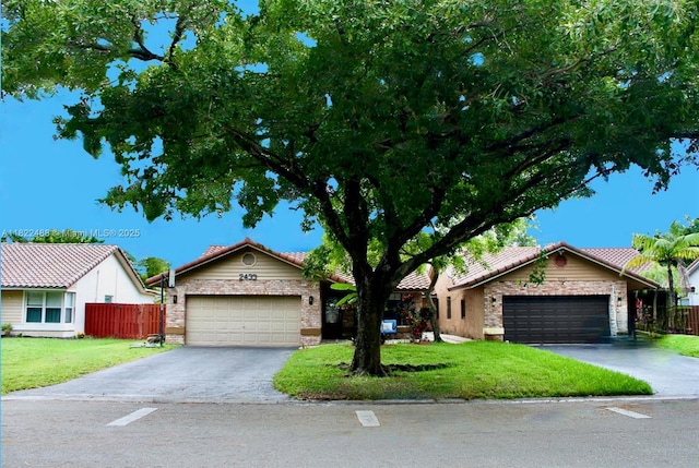 2433 NW 92nd Ave, Coral Springs, FL 33065 - ranch-style home featuring driveway, an attached garage, and a tiled roof