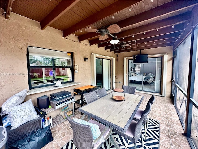 2433 NW 92nd Ave, Coral Springs, FL 33065 - sunroom featuring healthy amount of natural light, a ceiling fan, and beam ceiling