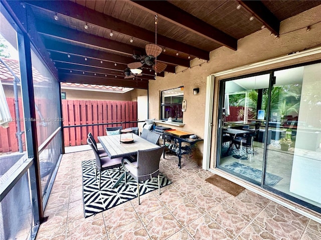 2433 NW 92nd Ave, Coral Springs, FL 33065 - sunroom featuring beam ceiling, a ceiling fan, and a chandelier