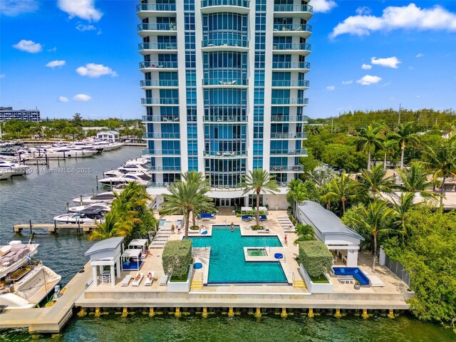 17301 Biscayne Blvd Unit 1704, North Miami Beach, FL 33160 - community pool with a dock, a water view, and a patio area