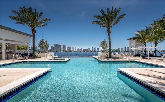 17301 Biscayne Blvd Unit 1704, North Miami Beach, FL 33160 - community pool with a community hot tub, a view of skyline, and a patio area