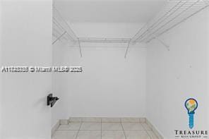 2910 Point E Dr Unit M610, Aventura, FL 33160 - walk in closet with tile patterned floors