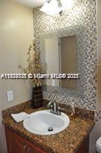 2910 Point E Dr Unit M610, Aventura, FL 33160 - bathroom with vanity and toilet