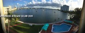 2910 Point E Dr Unit M610, Aventura, FL 33160 - view of swimming pool with a water view