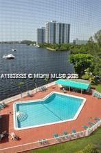2910 Point E Dr Unit M610, Aventura, FL 33160 - view of pool featuring a water view