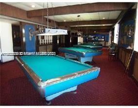 2910 Point E Dr Unit M610, Aventura, FL 33160 - recreation room with pool table and recessed lighting