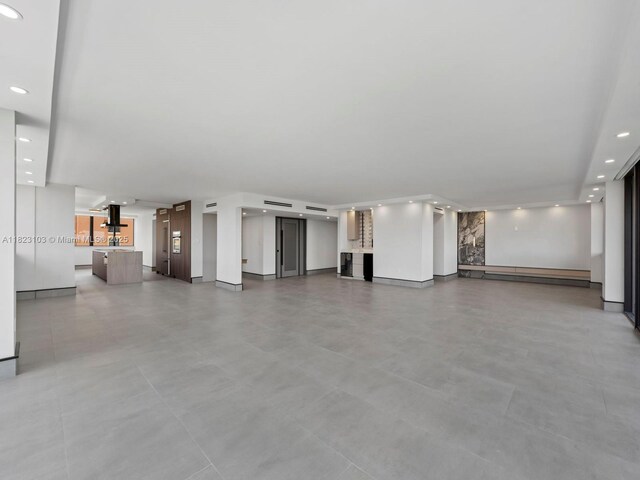 700 Coral Way Unit 5, Coral Gables, FL 33134 - unfurnished living room with recessed lighting