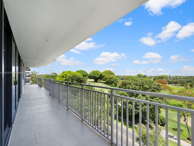 700 Coral Way Unit 5, Coral Gables, FL 33134 - balcony featuring view of wooded area