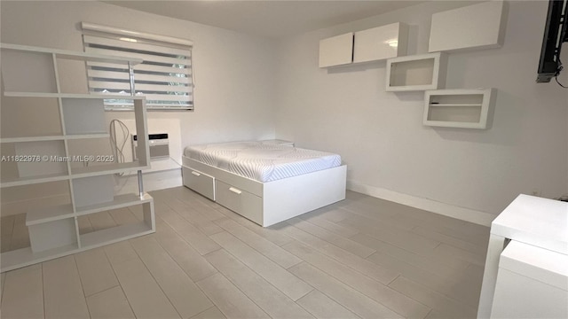 427 Santander Ave Unit 202, Coral Gables, FL 33134 - bedroom with wood finished floors and baseboards