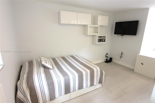 427 Santander Ave Unit 202, Coral Gables, FL 33134 - bedroom featuring baseboards