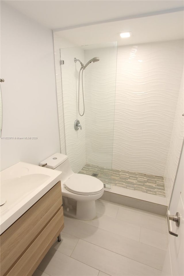 427 Santander Ave Unit 202, Coral Gables, FL 33134 - full bath with vanity, tiled shower, and tile patterned floors