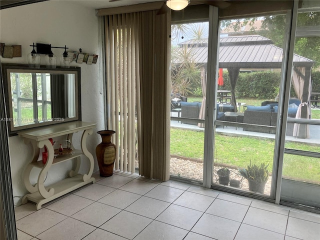 8605 W Sample Rd Unit 101, Coral Springs, FL 33065 - entryway featuring tile patterned flooring