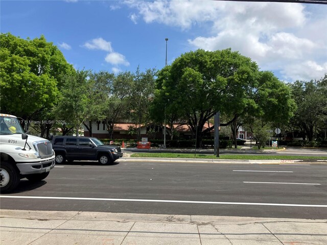 8605 W Sample Rd Unit 101, Coral Springs, FL 33065 - view of uncovered parking lot