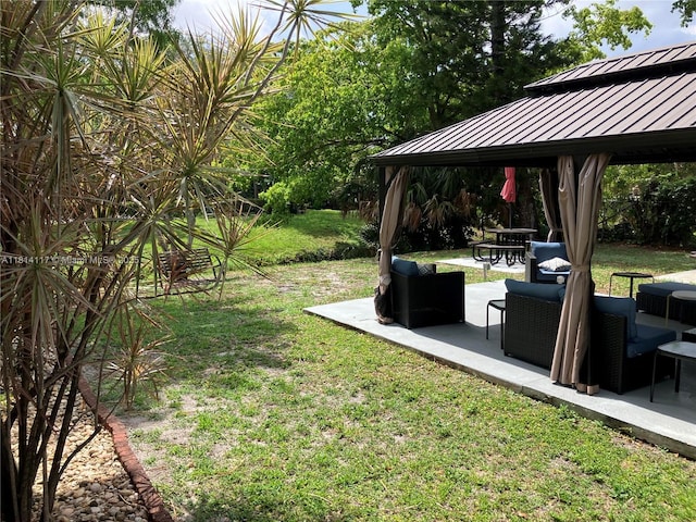 8605 W Sample Rd Unit 101, Coral Springs, FL 33065 - view of grassy yard with a gazebo and a patio area