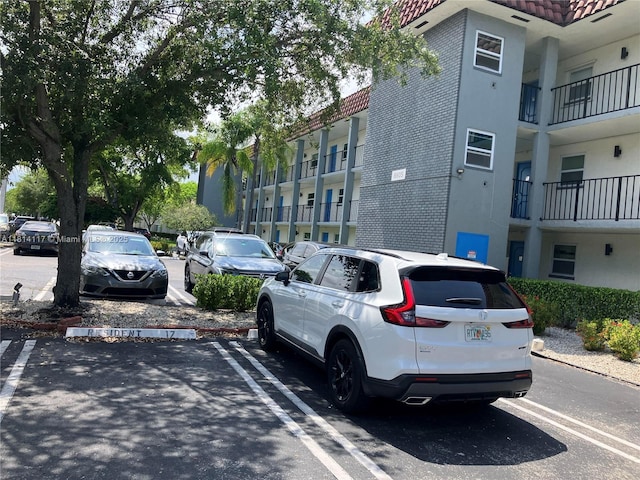 8605 W Sample Rd Unit 101, Coral Springs, FL 33065 - view of uncovered parking lot
