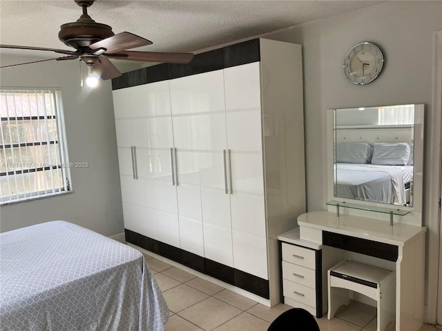 8605 W Sample Rd Unit 101, Coral Springs, FL 33065 - bedroom featuring a textured ceiling and light tile patterned flooring