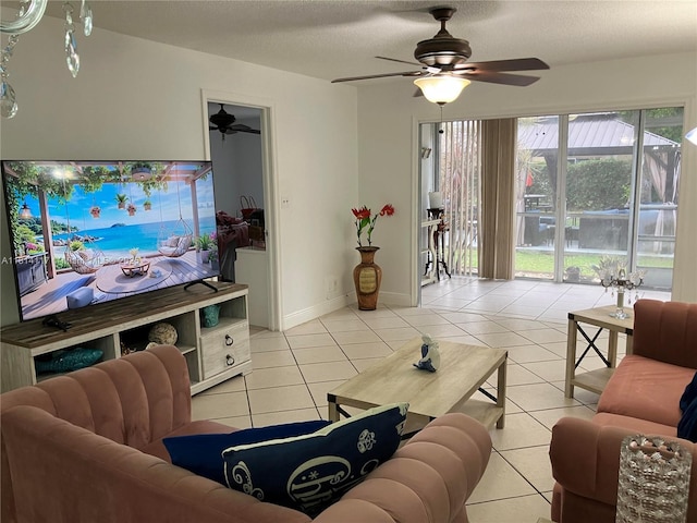 8605 W Sample Rd Unit 101, Coral Springs, FL 33065 - living room featuring a ceiling fan, light tile patterned floors, and a textured ceiling
