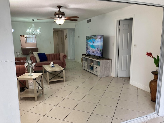 8605 W Sample Rd Unit 101, Coral Springs, FL 33065 - living room with light tile patterned floors, a ceiling fan, and a chandelier