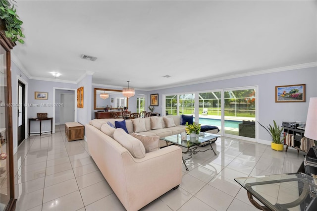 8861 SW 85th St, Miami, FL 33173 - living room featuring ornamental molding and light tile patterned floors